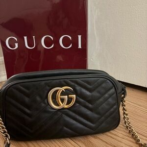 Gucci Black Crossbody Bag with Gold Accents